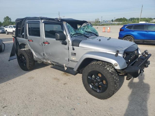 1C4BJWEG1EL229257 - 2014 JEEP WRANGLER U SAHARA SILVER photo 4