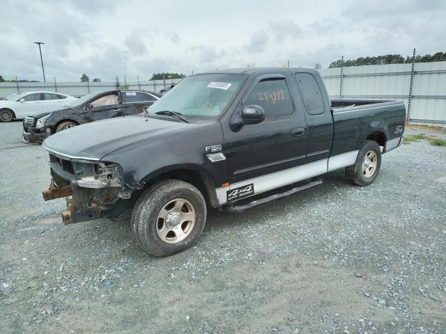 1FTZX17201NB48217 - 2001 FORD F-150 XL R BLACK photo 1