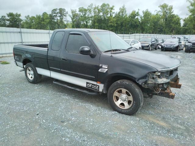 1FTZX17201NB48217 - 2001 FORD F-150 XL R BLACK photo 4