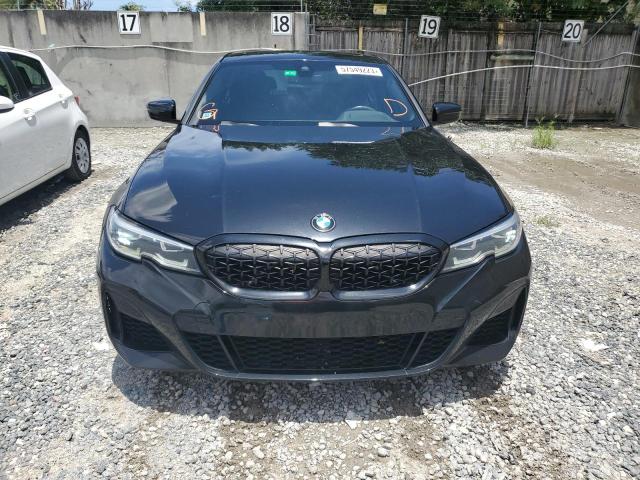 3MW5U7J08M8B52411 - 2021 BMW M340I BLACK photo 5