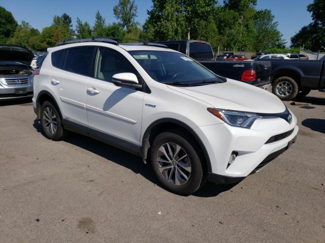 JTMRJREV7GD052760 - 2016 TOYOTA RAV4 HV XLE WHITE photo 4