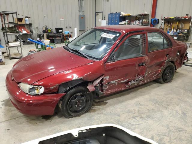 1Y1SK5289YZ401410 - 2000 CHEVROLET GEO PRIZM BASE BURGUNDY photo 1