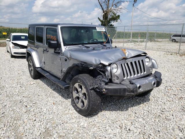 1C4BJWEG1GL305112 - 2016 JEEP WRANGLER U SAHARA GRAY photo 1