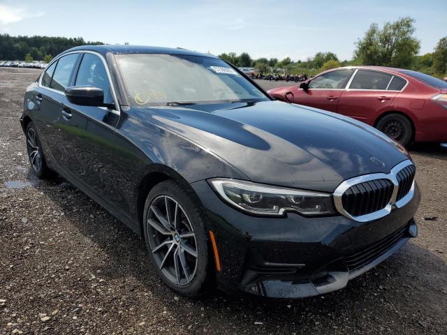 WBA5R7C50KAJ79808 - 2019 BMW 330XI Schwarz Foto 1