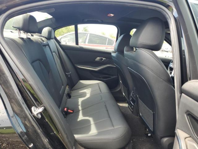 WBA5R7C50KAJ79808 - 2019 BMW 330XI Schwarz Foto 6