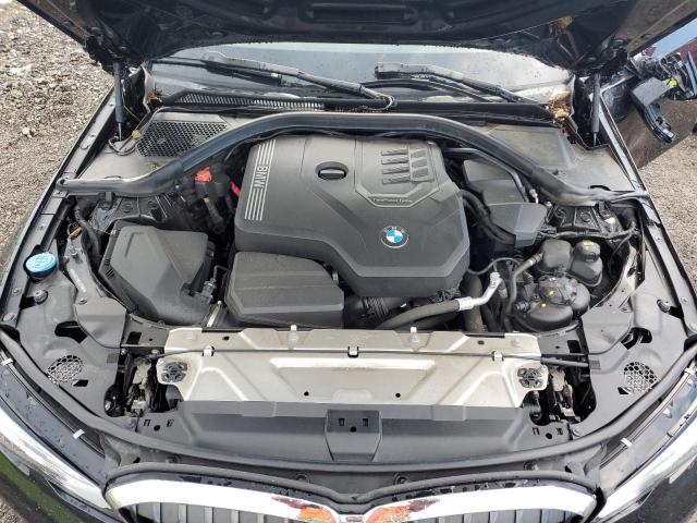 WBA5R7C50KAJ79808 - 2019 BMW 330XI Schwarz Foto 7