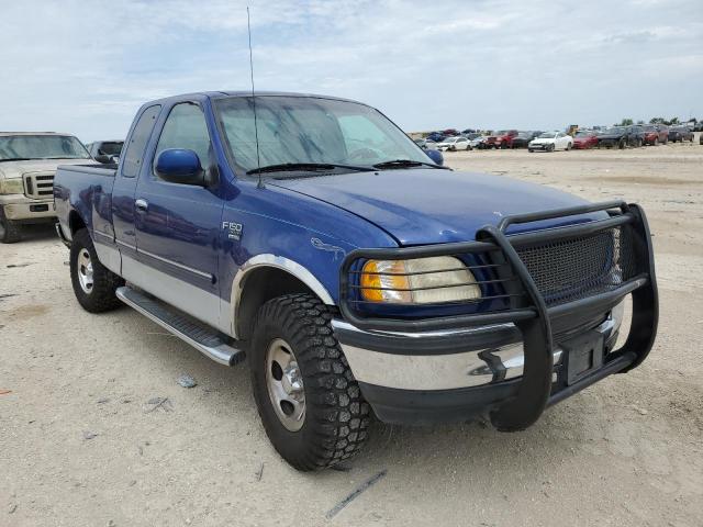 1FTZX1762WKA91692 - 1998 FORD 150 BLUE photo 4