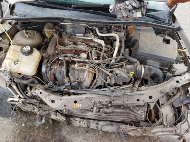 1FAFP34Z34W103874 - 2004 FORD FOCUS SE COMFORT TAN photo 11