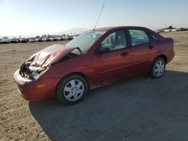 1FAFP34ZX4W144163 - 2004 FORD FOCUS SE COMFORT BURGUNDY photo 1