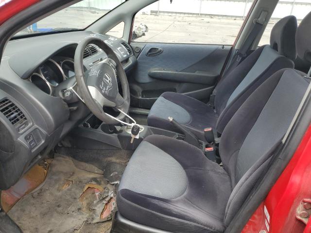 JHMGD386X7S062919 - 2007 HONDA FIT S RED photo 7