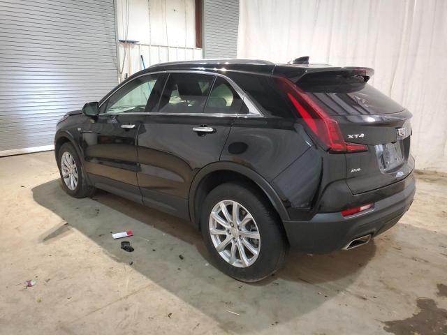 1GYFZBR40PF104376 - 2023 CADILLAC XT4 LUXURY BLACK photo 2