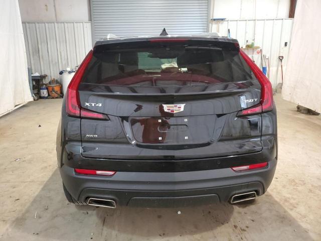 1GYFZBR40PF104376 - 2023 CADILLAC XT4 LUXURY BLACK photo 6