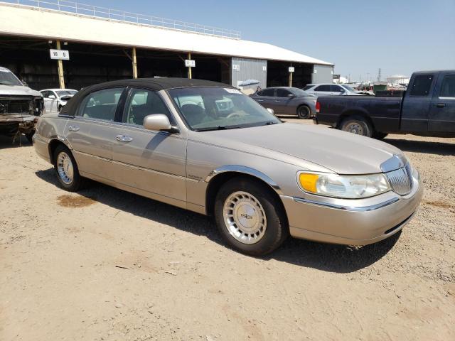 1LNHM81W3XY695610 - 1999 LINCOLN TOWN CAR EXECUTIVE SILVER photo 4