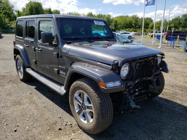 1C4HJXEG0JW303793 - 2018 JEEP WRANGLER U SAHARA GRAY photo 1