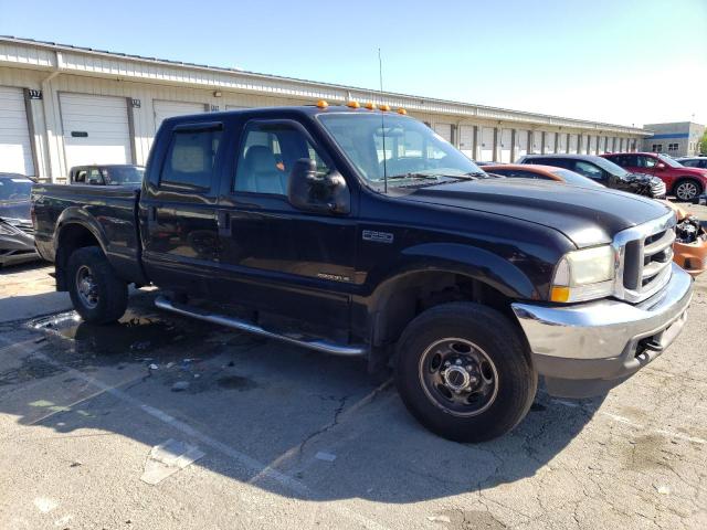 1FTNW21F02ED16667 - 2002 FORD F250 SUPER DUTY BLACK photo 4