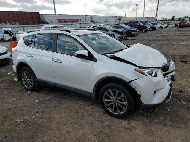 JTMDFREV9HJ171313 - 2017 TOYOTA RAV4 LIMITED WHITE photo 4