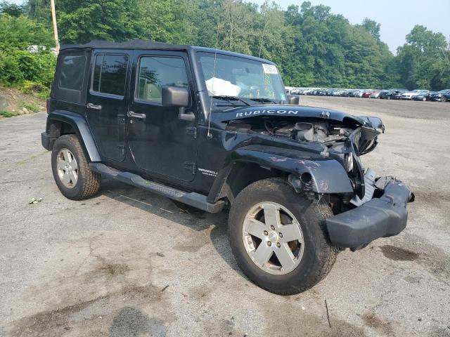 1J4GA59178L552524 - 2008 JEEP WRANGLER U SAHARA BLACK photo 4