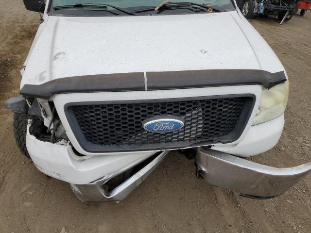 1FTPW12566KB72560 - 2006 FORD F150 SUPERCREW WHITE photo 11