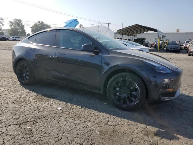 7SAYGAEE4RF041032 - 2024 TESLA MODEL Y GRAY photo 4