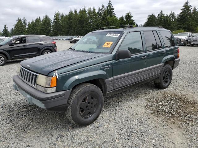 1J4GZ58S4SC650324 - 1995 JEEP GRAND CHER LAREDO GREEN photo 1