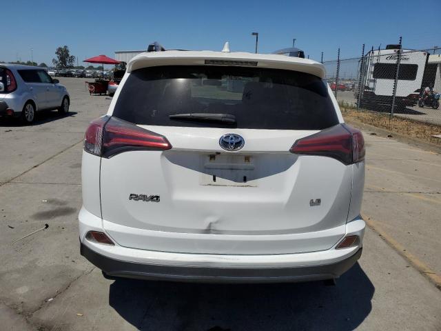 JTMZFREV0JD115772 - 2018 TOYOTA RAV4 LE WHITE photo 6