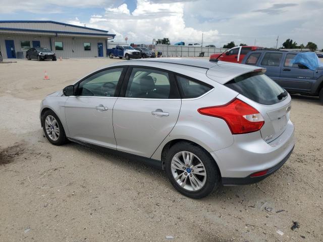 1FAHP3M24CL207074 - 2012 FORD FOCUS SEL SILVER photo 2