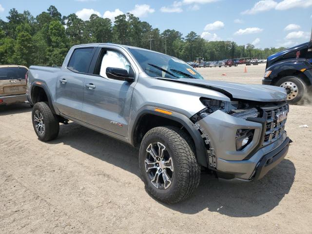 1GTP6DEK0P1173679 - 2023 GMC CANYON AT4 GRAY photo 4