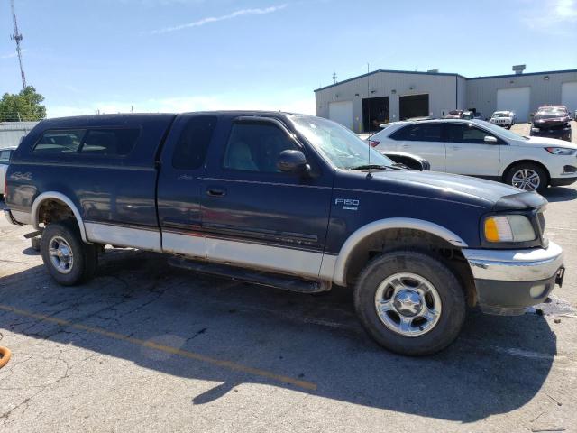 1FTRX18L1YNB17947 - 2000 FORD F150 BLUE photo 4