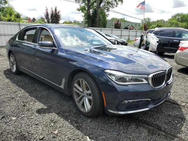 WBA7F2C5XGG415583 - 2016 BMW 750 XI BLUE photo 4