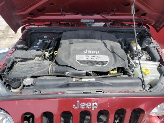 1C4HJWDG2DL555398 - 2013 JEEP WRANGLER U SPORT 棕色 照片 11