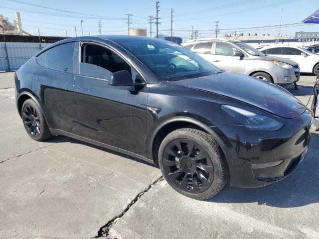 7SAYGDEE8RA231933 - 2024 TESLA MODEL Y BLACK photo 4