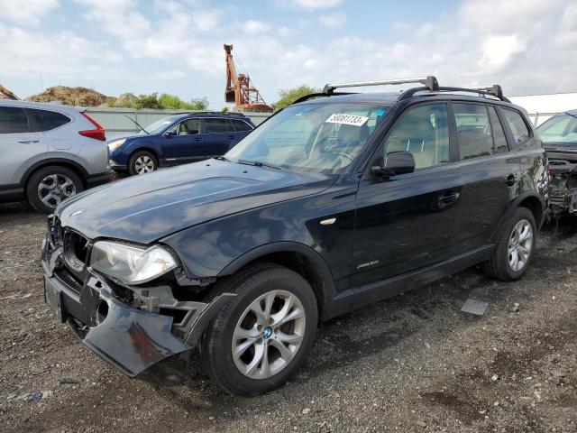 WBXPC93409WJ28017 - 2009 BMW X3 XDRIVE30I BLACK photo 1