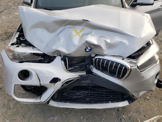 WBXHT3C36J5F89194 - 2018 BMW X1 XDRIVE28I SILVER photo 12