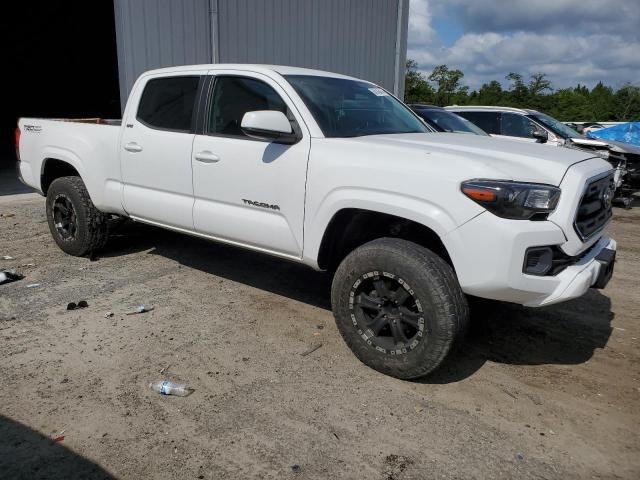 5TFBZ5DN9GX001537 - 2016 TOYOTA TACOMA DOUBLE CAB WHITE photo 4