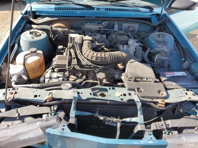 1G1JC1448R7160106 - 1994 CHEVROLET CAVALIER VL TEAL photo 11