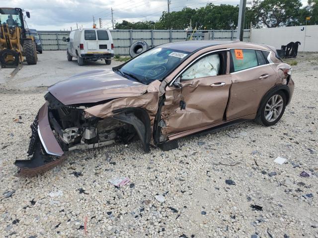 SJKCH5CP0HA025852 - 2017 INFINITI QX30 BASE PINK photo 1