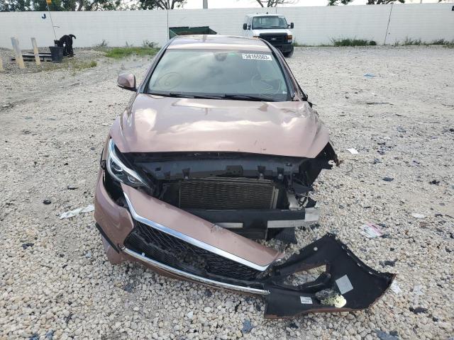 SJKCH5CP0HA025852 - 2017 INFINITI QX30 BASE PINK photo 5