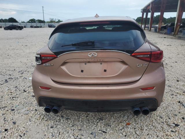 SJKCH5CP0HA025852 - 2017 INFINITI QX30 BASE PINK photo 6