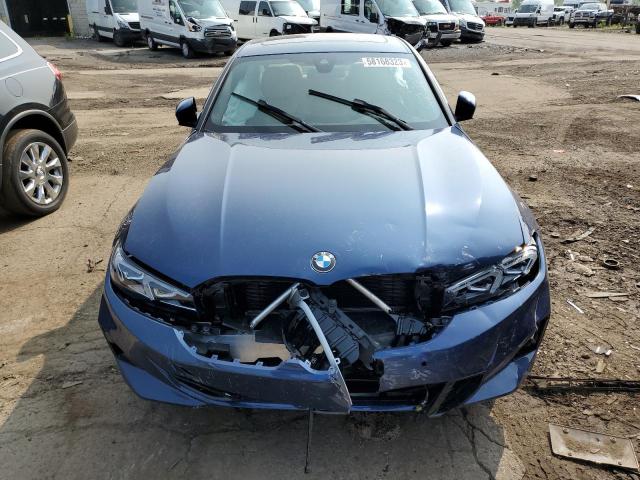 3MW89FF08P8D24474 - 2023 BMW 330XI BLUE photo 5