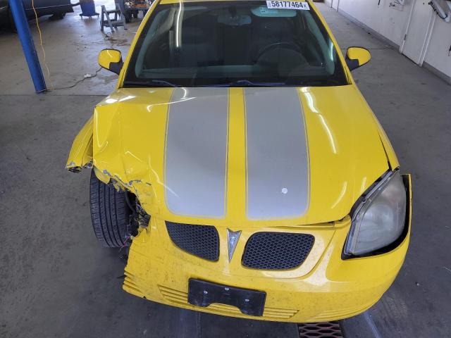 1G2AS18H697240743 - 2009 PONTIAC G5 Jaune photo 11