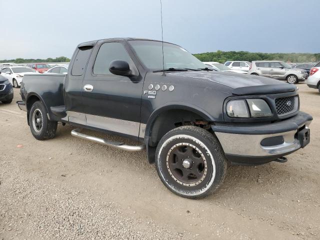 1FTZX08W3WKB49981 - 1998 FORD F150 BLACK photo 4