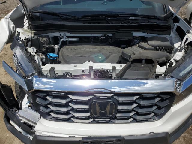 5FNYF8H58PB011419 - 2023 HONDA PASSPORT EXL WHITE photo 12