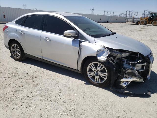 1FAHP3H20CL429637 - 2012 FORD FOCUS SEL SILVER photo 4