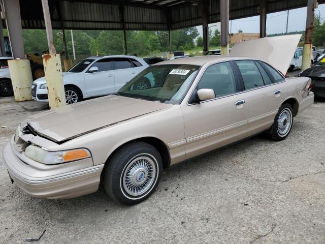 2FALP73WXVX148866 - 1997 FORD CROWN VIC TAN photo 1