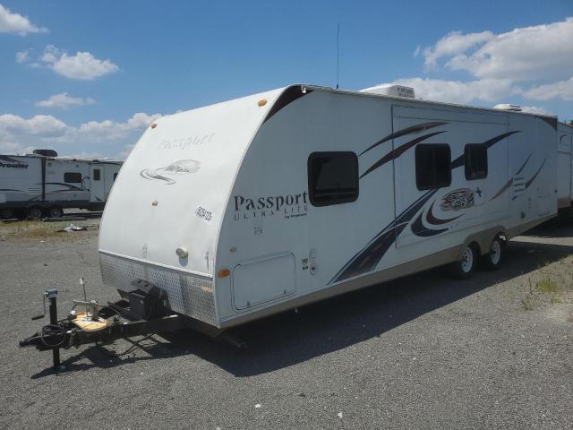 4YDT29222AT412833 - 2010 KEYSTONE PASSPORT WHITE photo 2