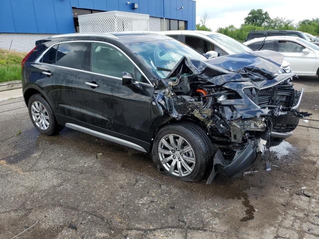 1GYFZDR49MF025294 - 2021 CADILLAC XT4 PREMIUM LUXURY BLACK photo 4