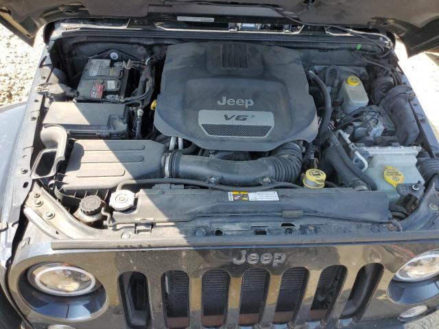 1C4BJWEG8EL139006 - 2014 JEEP WRANGLER U SAHARA BLACK photo 12