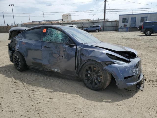 7SAYGAEE2PF829076 - 2023 TESLA MODEL Y ნაცრისფერი ფოტო 4