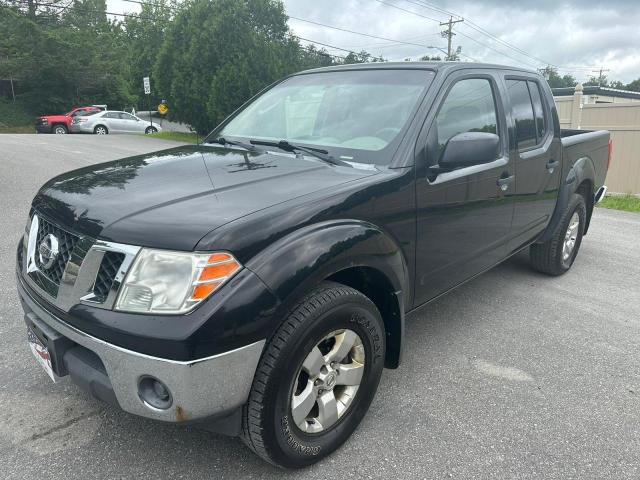 1N6AD07W19C415520 - 2009 NISSAN FRONTIER CREW CAB SE BLACK photo 1