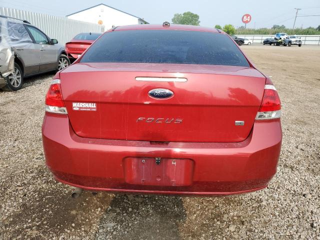 1FAHP3FN7AW121051 - 2010 FORD FOCUS SE RED photo 6